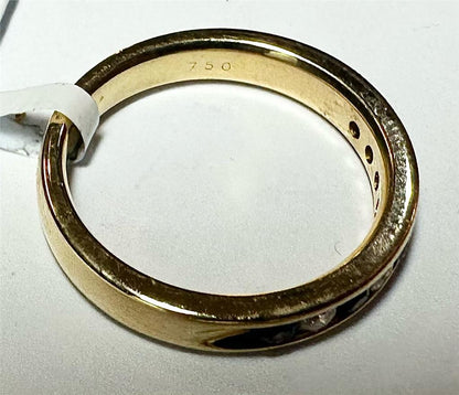 18ct yellow gold sapphire and diamond ring in size N, featuring a central sapphire with diamond accents.