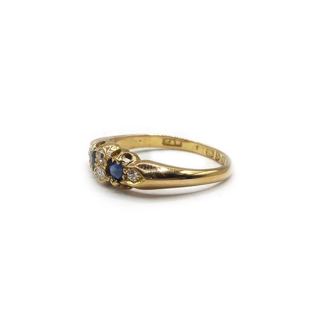 18ct yellow gold sapphire and diamond ring in size N1/2, featuring a stunning gemstone and elegant design.