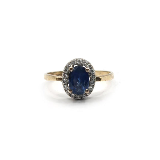 18ct yellow gold sapphire and diamond ring with a central sapphire gemstone and small accent diamonds.