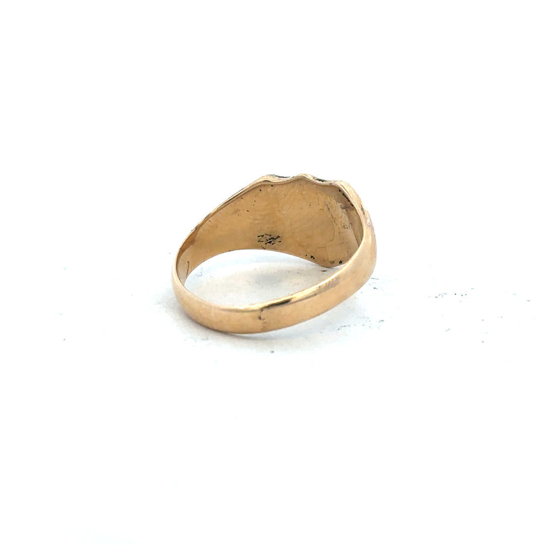 18ct yellow gold signet ring in size O with a smooth polished surface, unbranded jewelry, close-up view of the ring's detailed design.