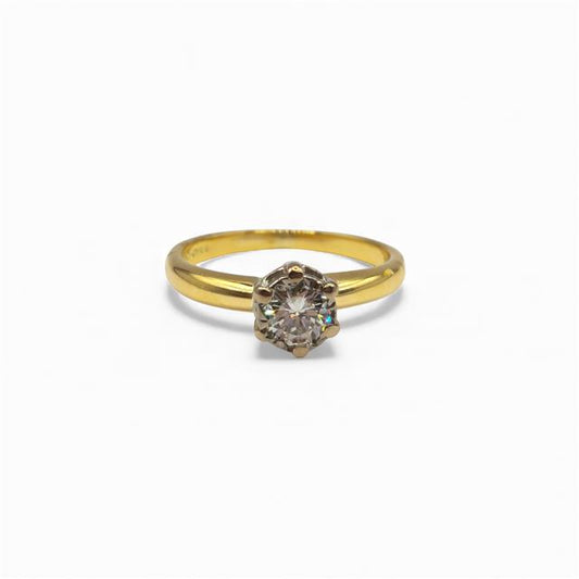 18ct yellow gold diamond ring with a single sparkling diamond stone, elegant jewelry piece.