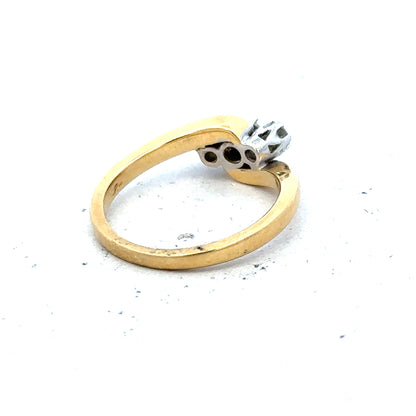18ct yellow gold three-diamond ring with a sleek band and sparkling diamonds, elegant jewelry for special occasions