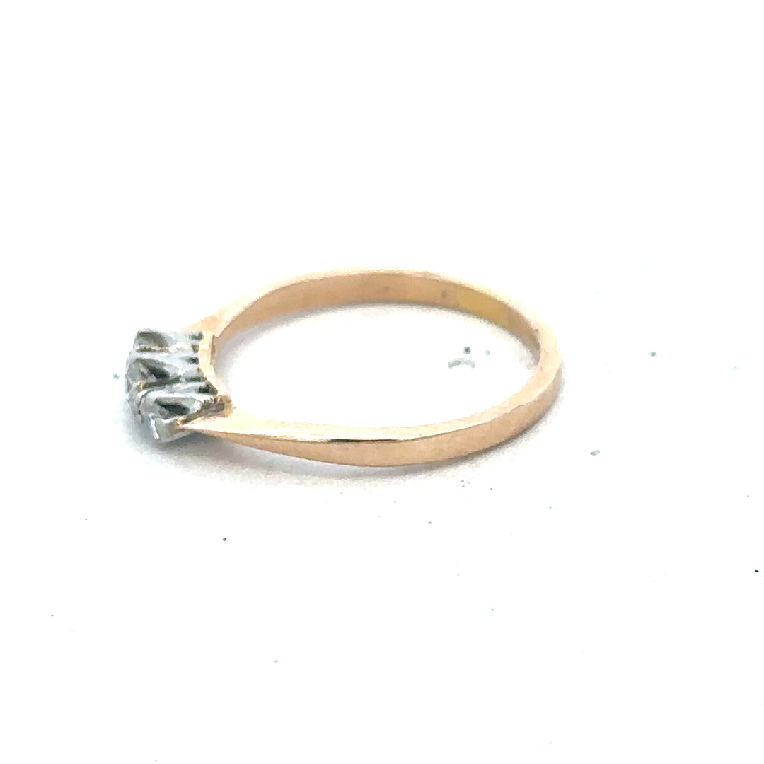 18ct yellow gold three diamond ring featuring a simple, elegant design with sparkling diamonds set in a classic band.