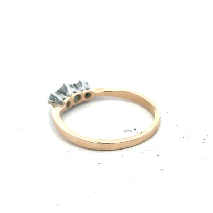 18ct yellow gold three diamond ring with a classic design, featuring sparkling diamonds set in a simple gold band.