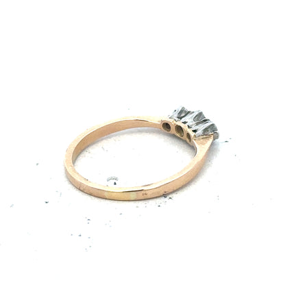 18ct yellow gold three diamond ring featuring a simple band and sparkling diamonds, showcasing elegant fine jewelry.