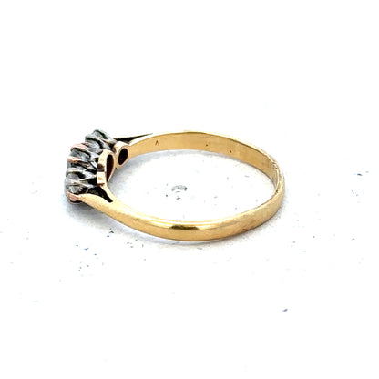 18ct yellow gold three diamond ring in size L, featuring a classic design with sparkling diamonds on a sleek band.