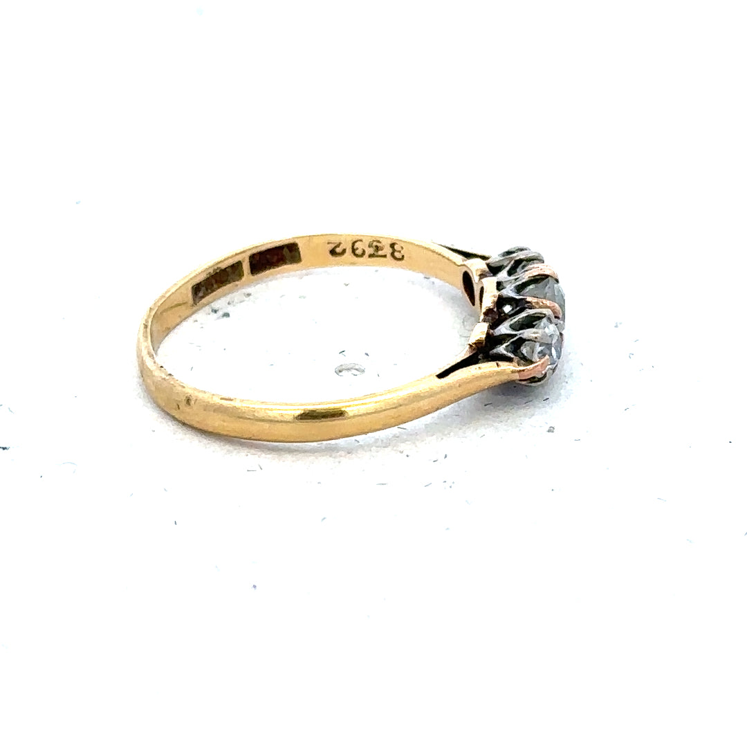 18ct yellow gold three diamond ring in size L, featuring a simple and elegant design with sparkling diamonds.