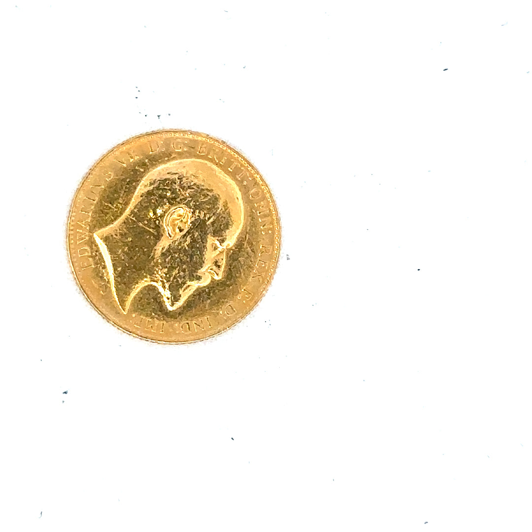 1910 full sovereign coin, 8g, unbranded, showing detailed design and historical features of the gold coin.