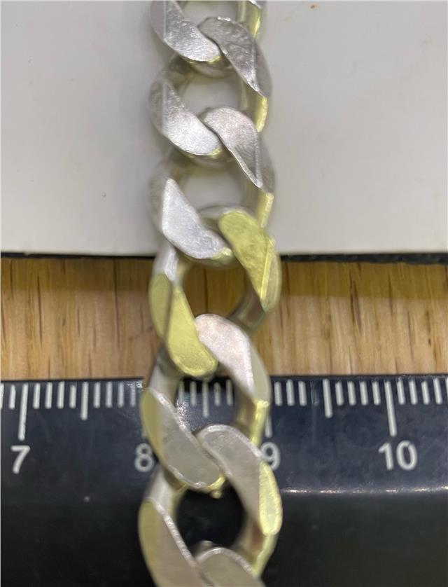 925 silver bracelet with intricate design, unbranded jewelry accessory in a close-up image.