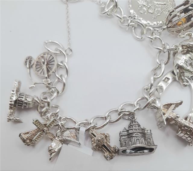 925 silver charm bracelet, 7-inch unbranded jewelry with intricate charm details, weighs 53.6g, stylish accessory.