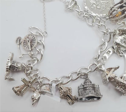 925 silver charm bracelet, 7-inch unbranded jewelry with intricate charm details, weighs 53.6g, stylish accessory.
