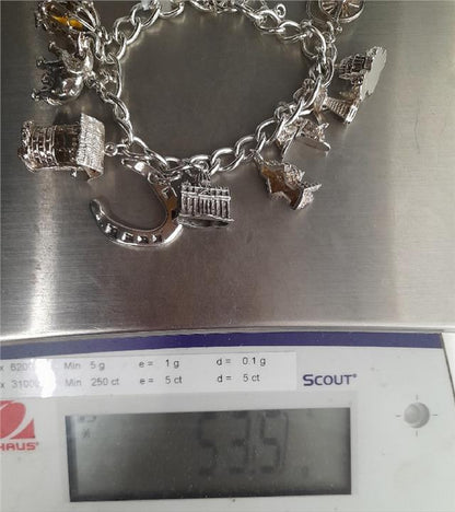 925 silver charm bracelet, 7-inch, unbranded, with detailed charms and clasp, weighing 53.6 grams, stylish jewelry accessory.
