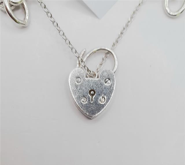925 silver charm bracelet, 7-inch unbranded jewelry with detailed charms, weighs 53.6g, stylish and elegant accessory.