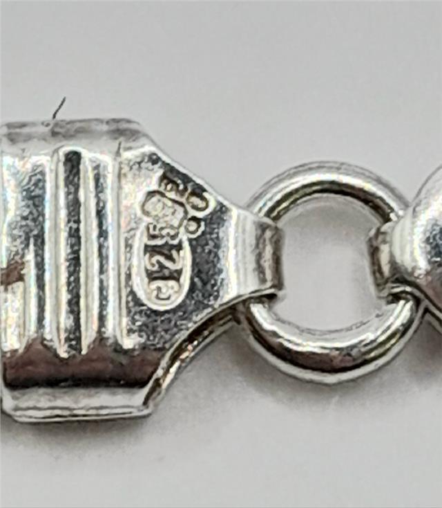 925 silver curb bracelet, unbranded, 26g weight, 20.5cm length, showing detailed silver chain links.