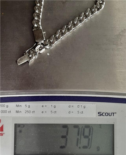 925 silver curb bracelet with a 24cm chain and 37.9g weight, featuring detailed curb links, unbranded jewelry accessory.