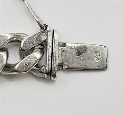 925 silver curb bracelet, unbranded, 24cm length, 37.9g, detailed chain design, shown on a neutral background.