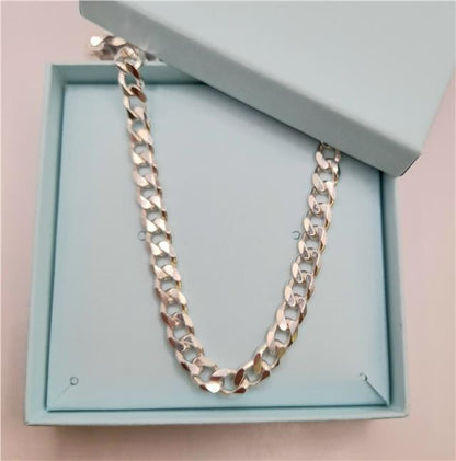 925 silver curb chain, 20 inches long, with a shiny finish and sturdy links, weighing 48.6 grams.
