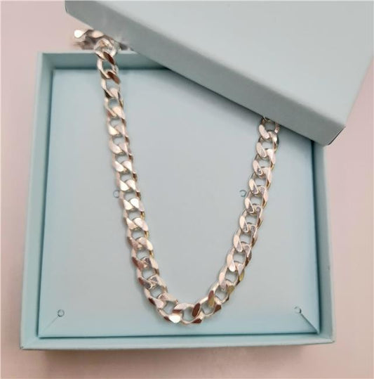 925 silver curb chain, 20 inches long, with a shiny finish and sturdy links, weighing 48.6 grams.