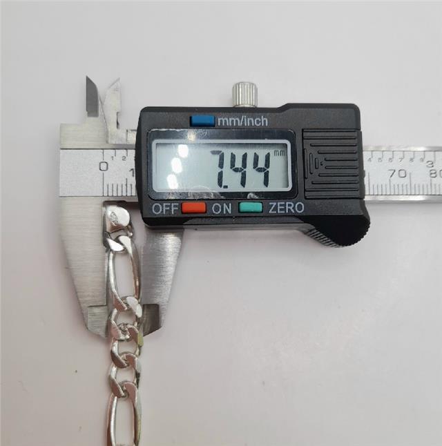 925 silver Figaro chain, 18 inch length, weighs 37.7g, unbranded jewelry with detailed links, displayed on a plain background.