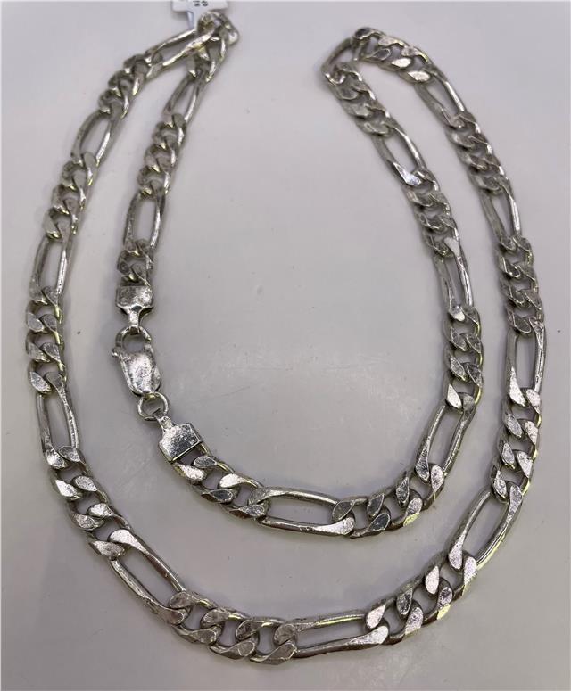 925 silver Figaro chain with polished links, unbranded jewelry accessory, showcasing its elegant design and shiny finish.