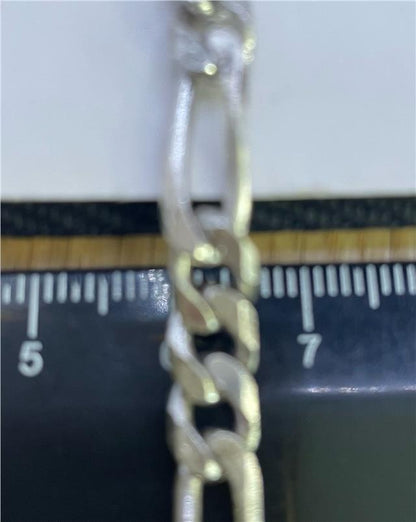 925 silver Figaro chain with intricate links, showcasing a sleek and polished design, ideal for everyday wear.