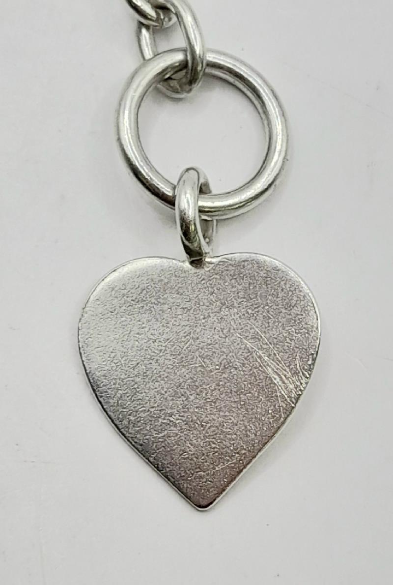 925 silver heart chain weighing 29.7g, featuring a delicate design and intricate heart links, perfect for elegant jewelry.