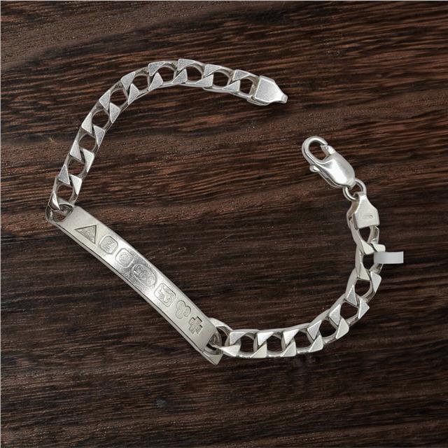 925 silver ID bracelet with a sleek design, weighing 18.4g and measuring 8.2 inches, perfect for stylish everyday wear.