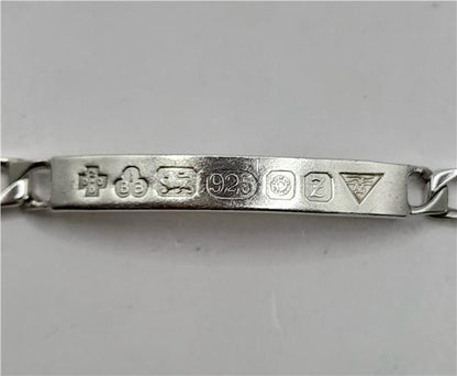 925 silver ID bracelet with an 8.2-inch length and 18.4g weight, featuring a sleek, polished design on a plain silver bracelet.