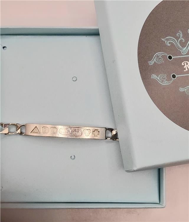 925 silver ID bracelet weighing 18.4g, 8.2 inch length, unbranded jewelry with a sleek, polished finish.