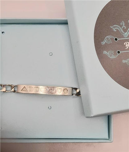 925 silver ID bracelet weighing 18.4g, 8.2 inch length, unbranded jewelry with a sleek, polished finish.