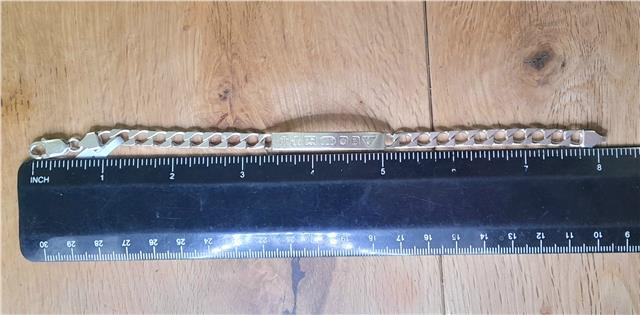 925 silver ID bracelet with a simple design, weighing 18.4g and measuring 8.2 inches in length.