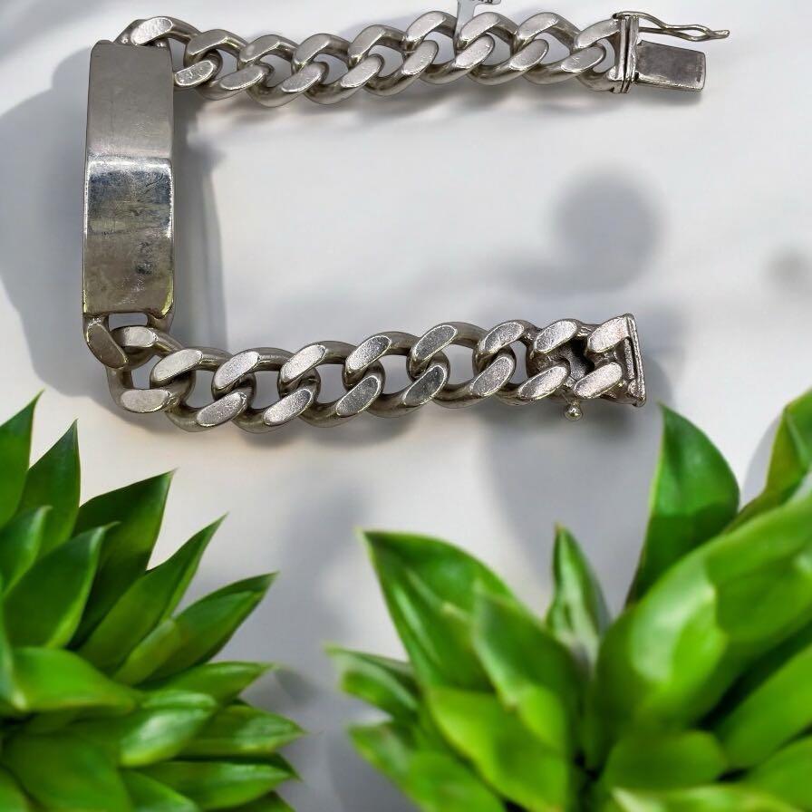 925 silver ID bracelet with polished finish, featuring a sleek rectangular plate on a delicate chain.