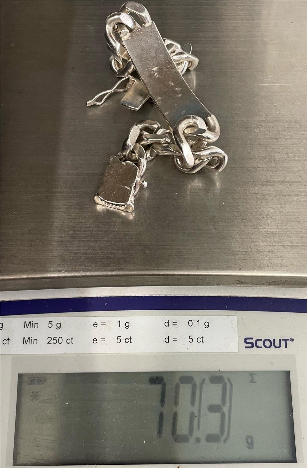 925 silver ID bracelet with engraved plate, unbranded jewelry piece featuring a sleek, polished finish and adjustable chain.