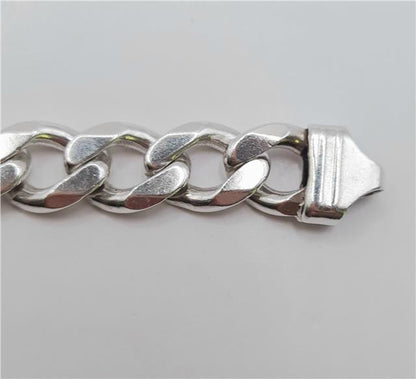 925 silver ID curb bracelet, 22cm length, unbranded, with a sleek silver chain and ID plate, displayed on a neutral background.