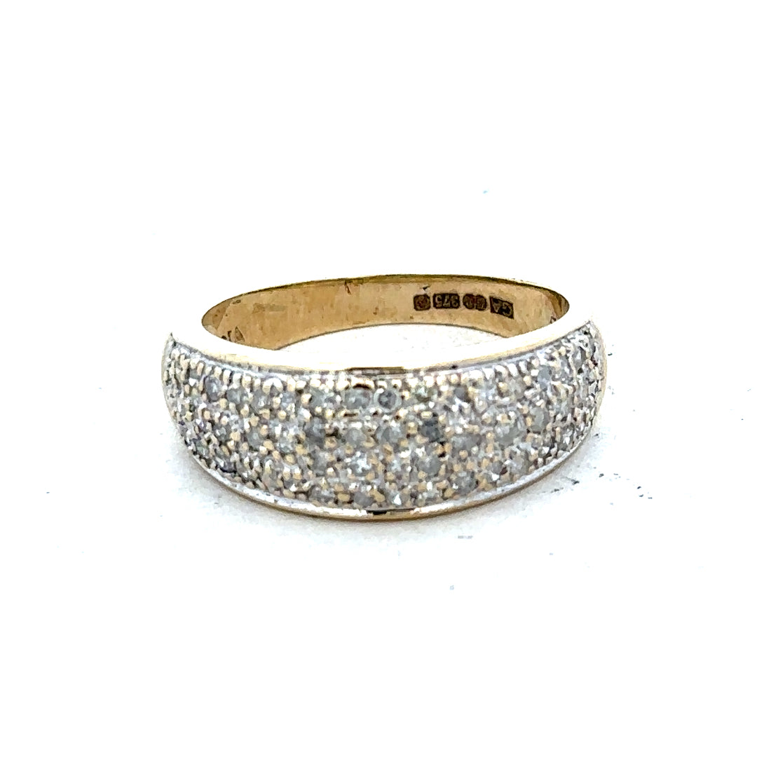 9ct diamond ring with 1/2 carat total weight, size M, featuring a sparkling diamond on a 3.4g band.