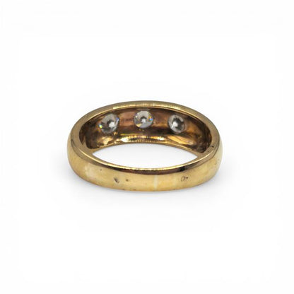 9ct yellow gold ring with three diamonds, featuring a classic design and polished finish.
