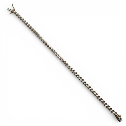 9ct diamond line bracelet with sparkling diamonds on a sleek gold chain, unbranded jewelry piece for elegant style.