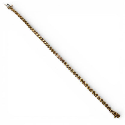9ct diamond line bracelet featuring sparkling diamonds set in a delicate gold chain, elegant jewelry accessory.