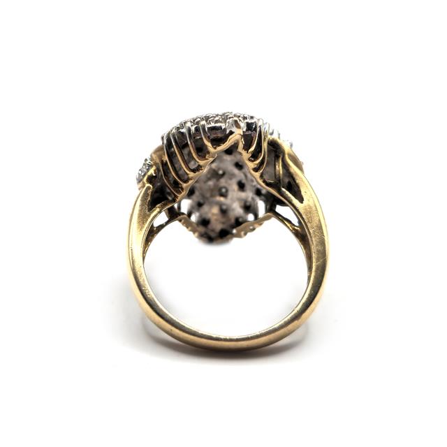 Elegant 9ct diamond ring featuring a sparkling central diamond set in a classic band, unbranded jewelry piece.