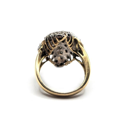 Elegant 9ct diamond ring featuring a sparkling central diamond set in a classic band, unbranded jewelry piece.