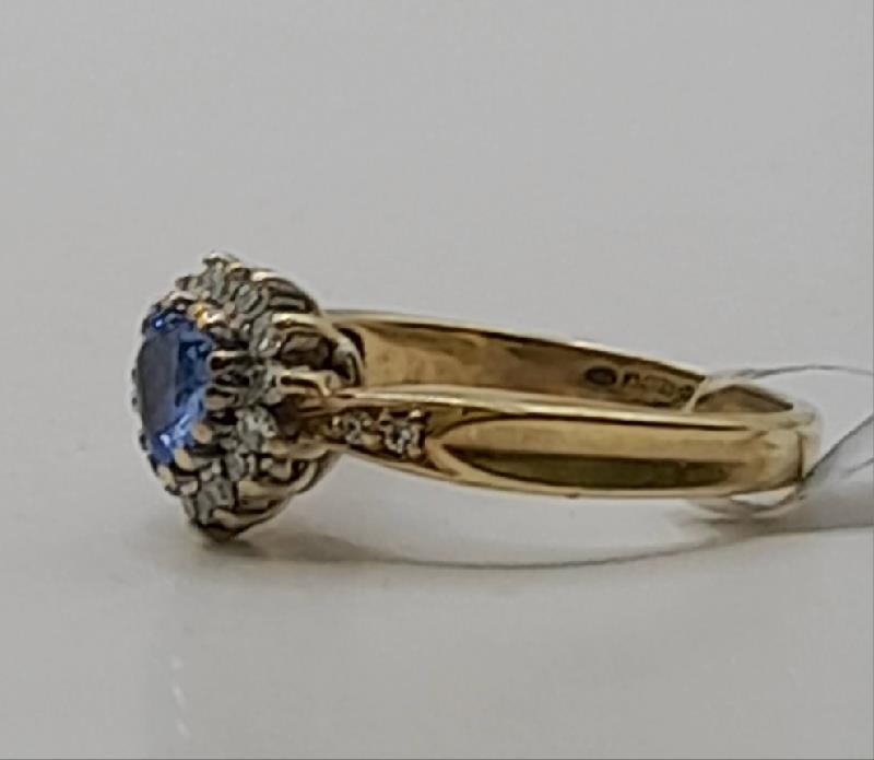9ct diamond ring in size J1/2 featuring sparkling diamonds and a gold band, weighing 2.8g.