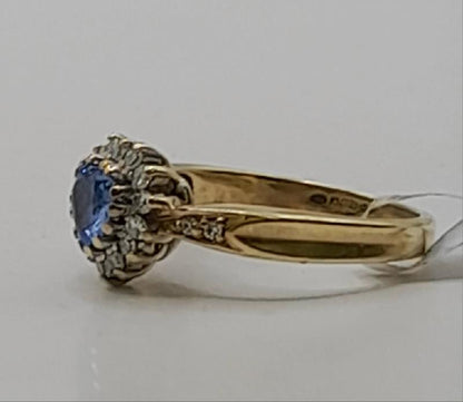 9ct diamond ring in size J1/2 featuring sparkling diamonds and a gold band, weighing 2.8g.