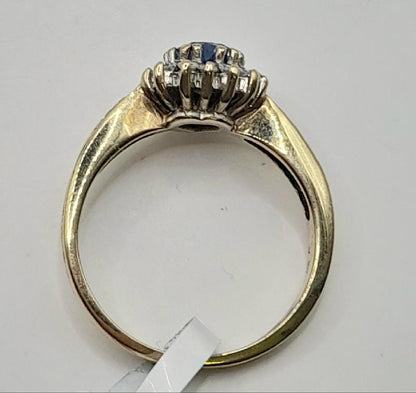 9ct diamond ring in size J1/2 with 2.8g weight, featuring sparkling diamonds and a sleek band design.