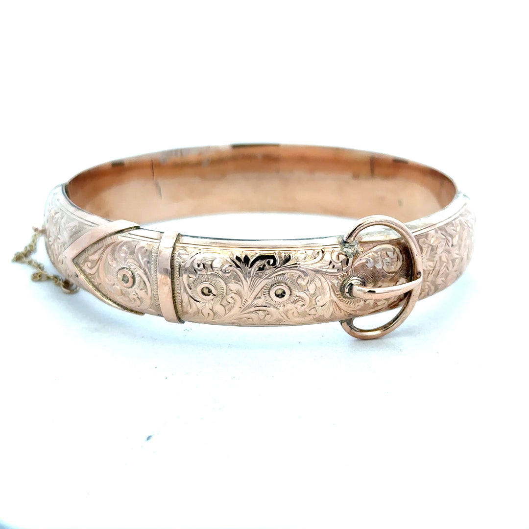 9ct gold bangle weighing 17.9g, featuring a smooth, polished finish and classic circular design, unbranded jewelry accessory