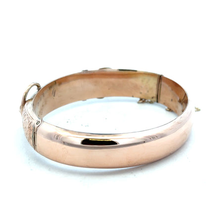 9ct gold bangle weighing 17.9g, unbranded, with a smooth polished finish, shown on a plain background.