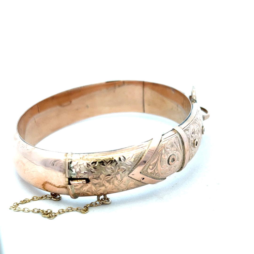 9ct gold bangle weighing 17.9g, unbranded, with a smooth polished finish and elegant circular design.