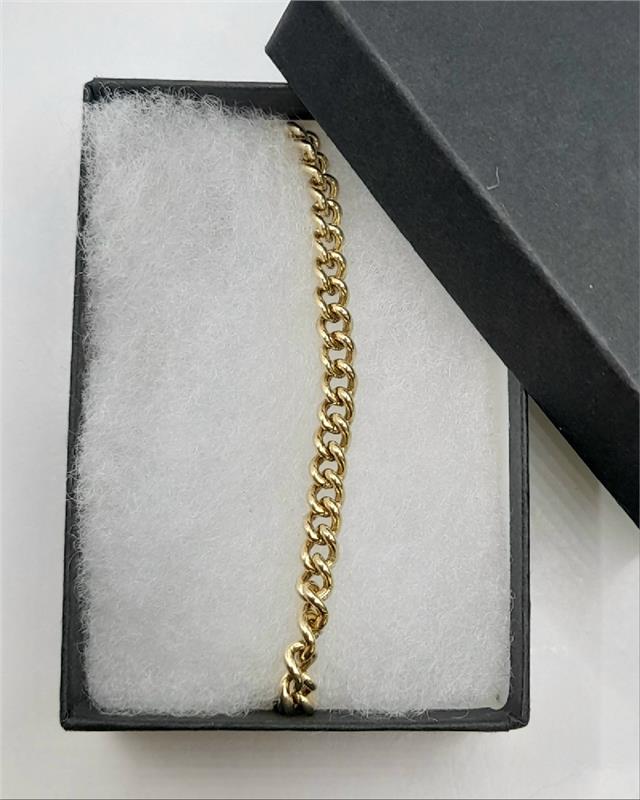 9ct gold bracelet with a 12.6g weight and 21cm length, featuring a sleek unbranded design.