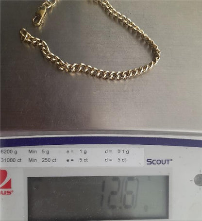 9ct gold bracelet weighing 12.6g and measuring 21cm, featuring a classic design and unbranded style.