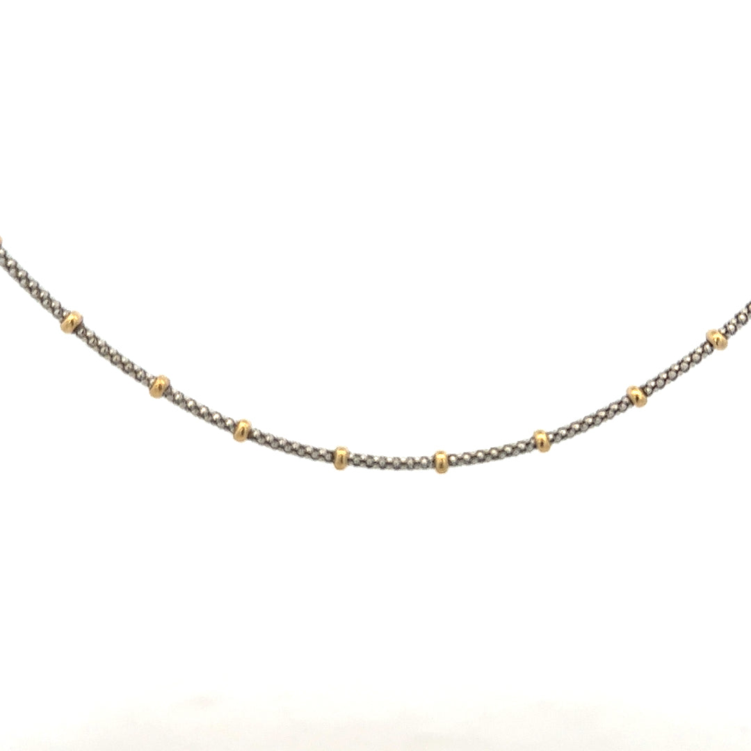 9ct gold chain weighing 5.6g, displayed on a neutral background, showcasing its classic link design and polished finish.