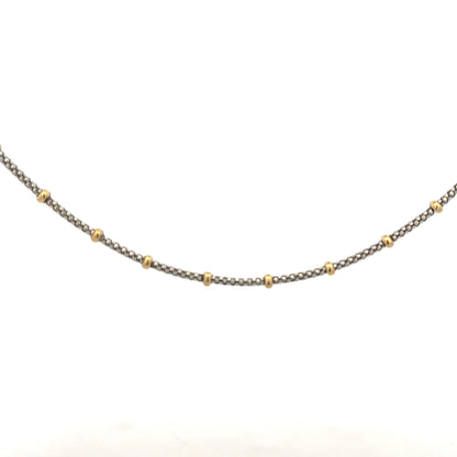 9ct gold chain weighing 5.6g, displayed on a neutral background, showcasing its classic link design and polished finish.